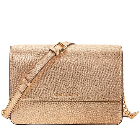 michael kors gold bag pealing|Michael Kors gold crossbody bag.